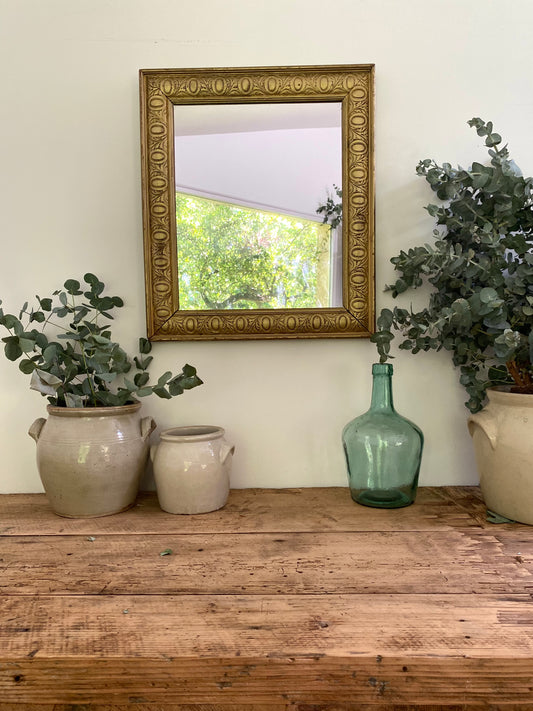 Miroir ancien en bois doré