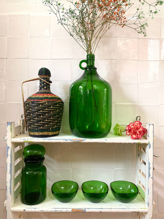 Dame jeanne en verre ancien vert