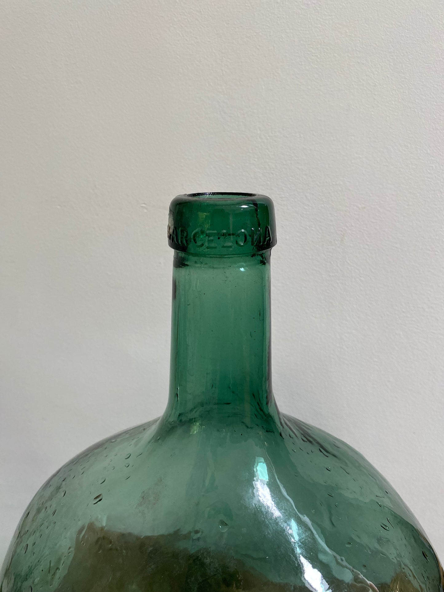 Dame Jeanne ancienne en verre bullé