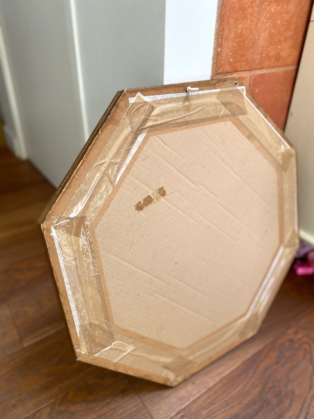 Miroir octogonal en bois doré, verre biseauté, années 70