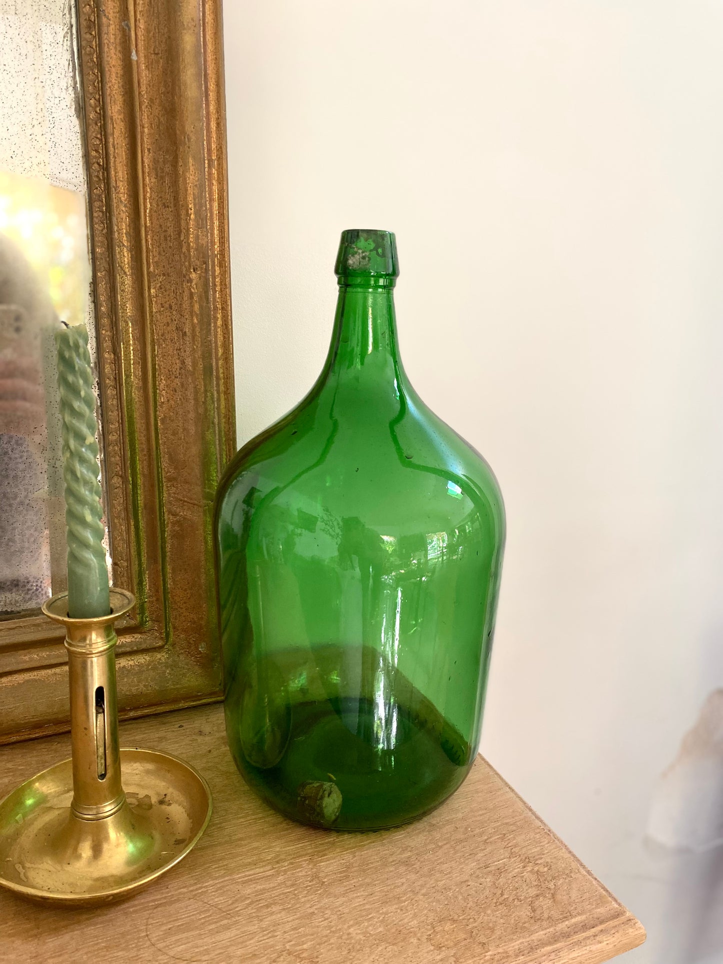 Dame jeanne en verre ancien