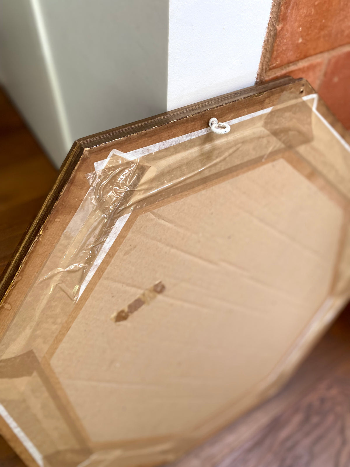 Miroir octogonal en bois doré, verre biseauté, années 70