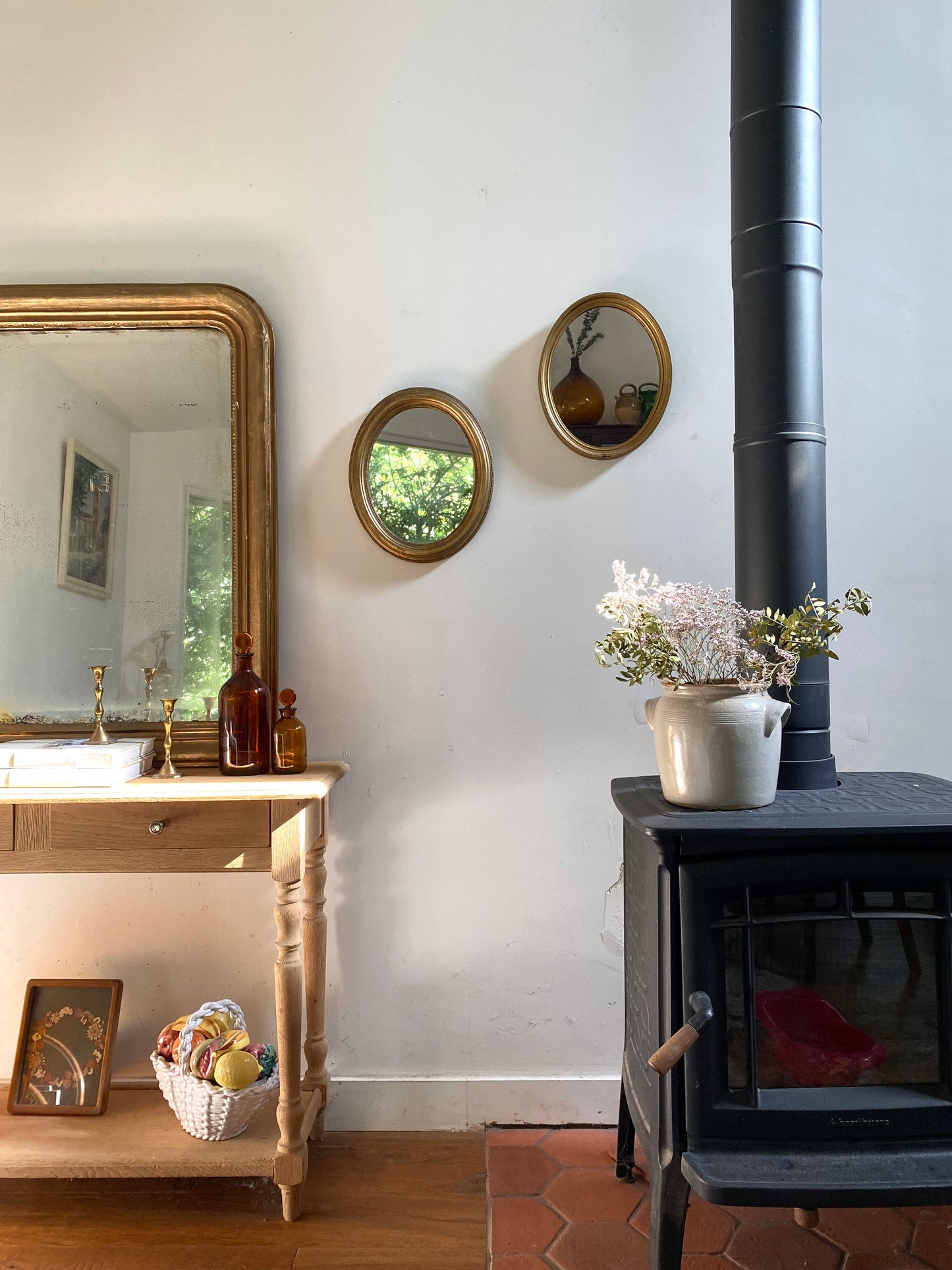Miroir ovale en bois doré