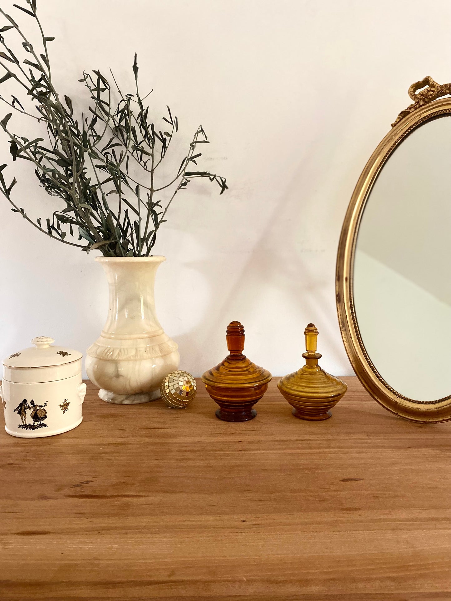 Petit pot à poudre en verre ambré vintage