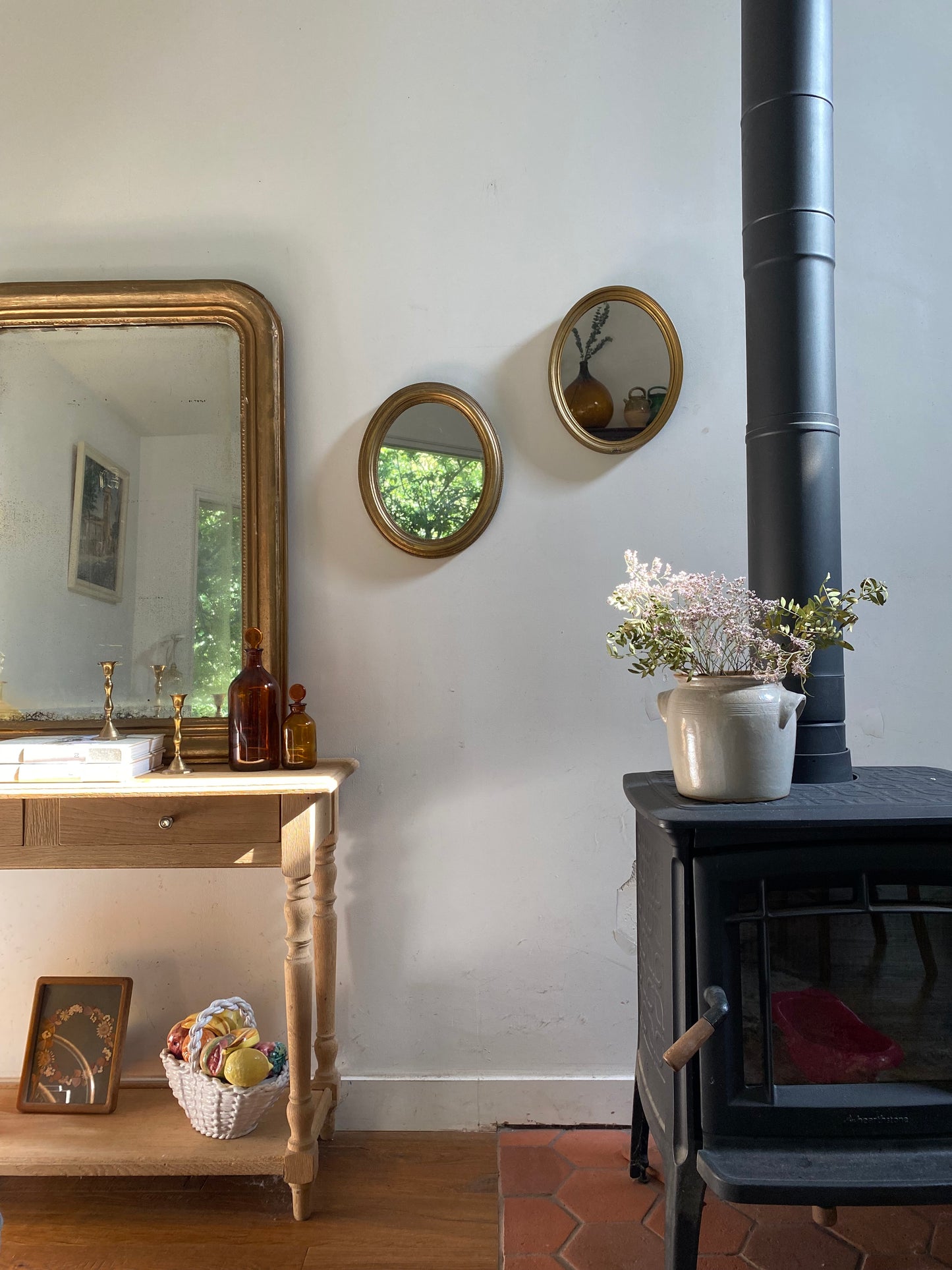 Miroir ovale en bois doré