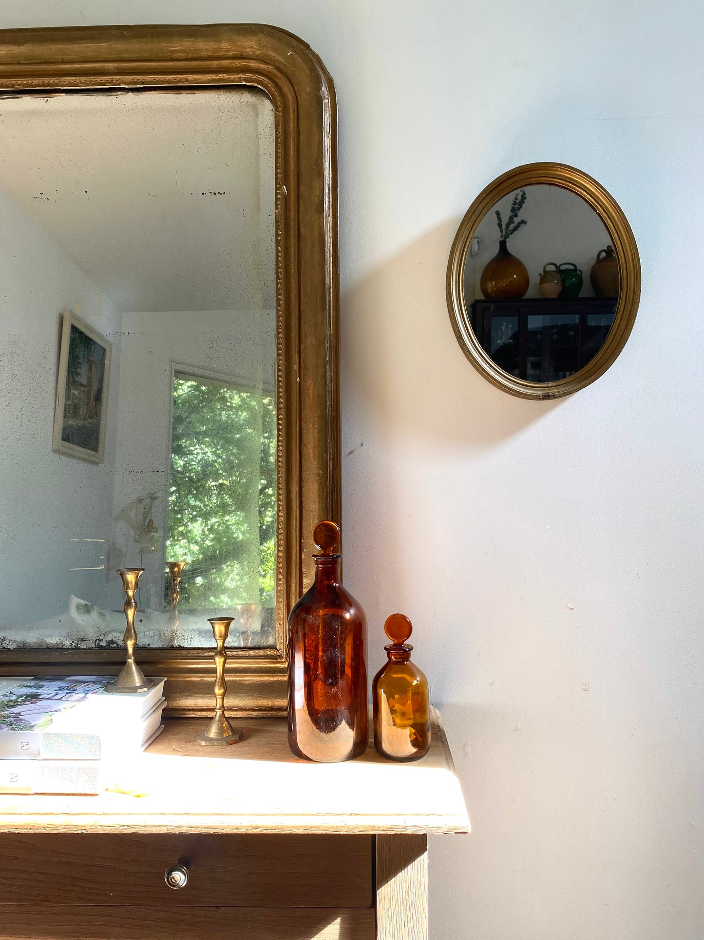 Miroir ovale en bois doré