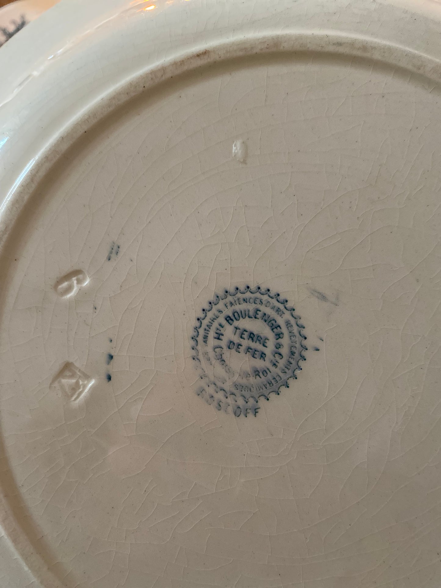 Plat creux en faïence Terre de fer