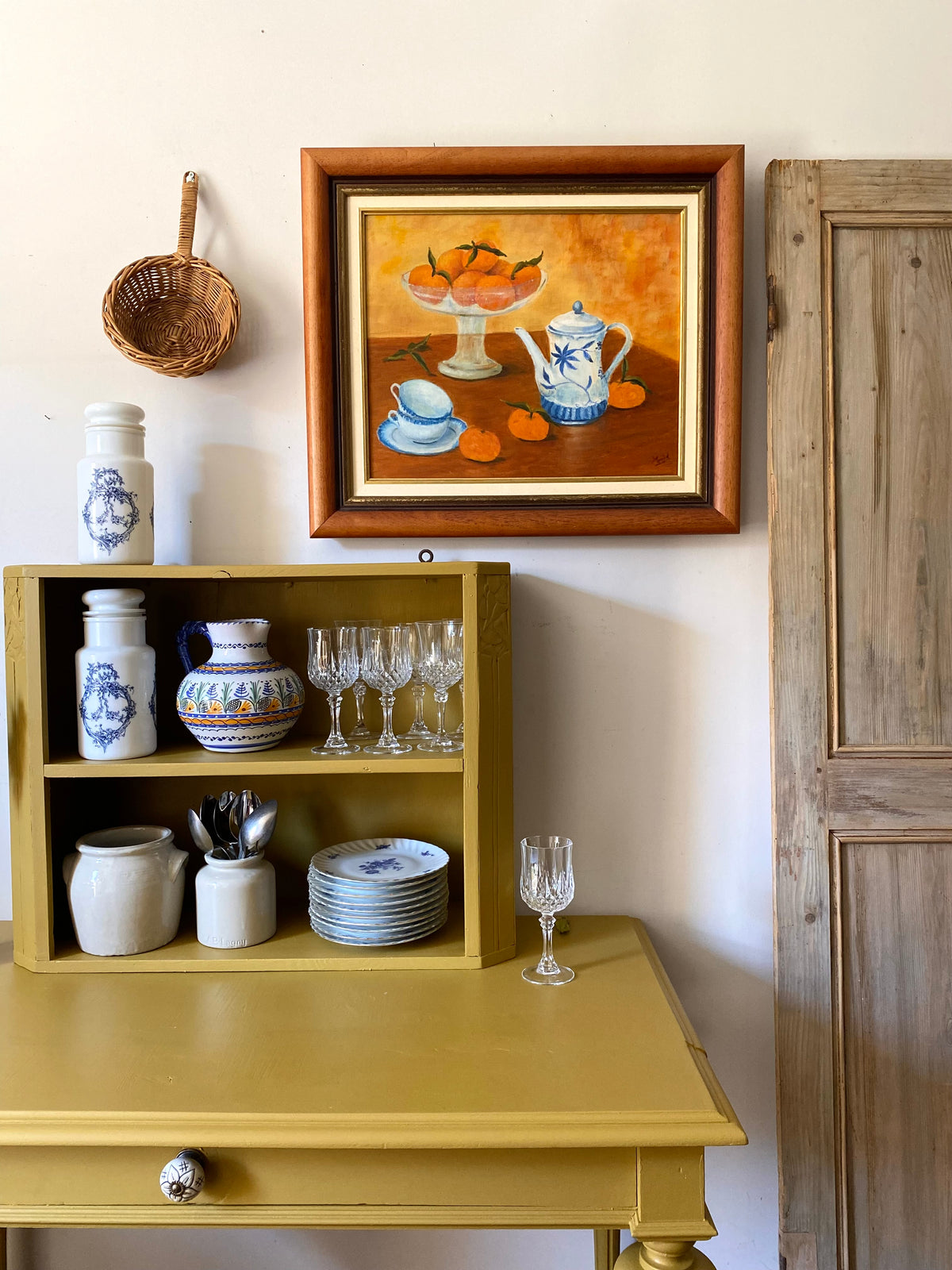 Tableau nature morte aux mandarines et faïence bleue, huile sur toile encadrée