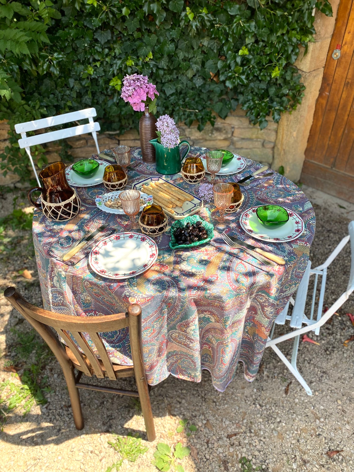 Table ronde en bois ancien à 2 rabats